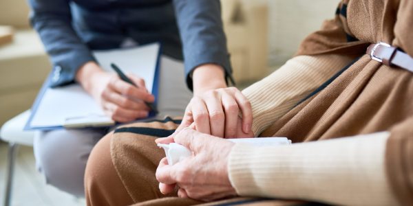 Supportive Female Psychologist Image of hands counselling
